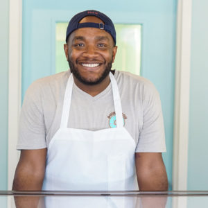 Donut shop owner with apron